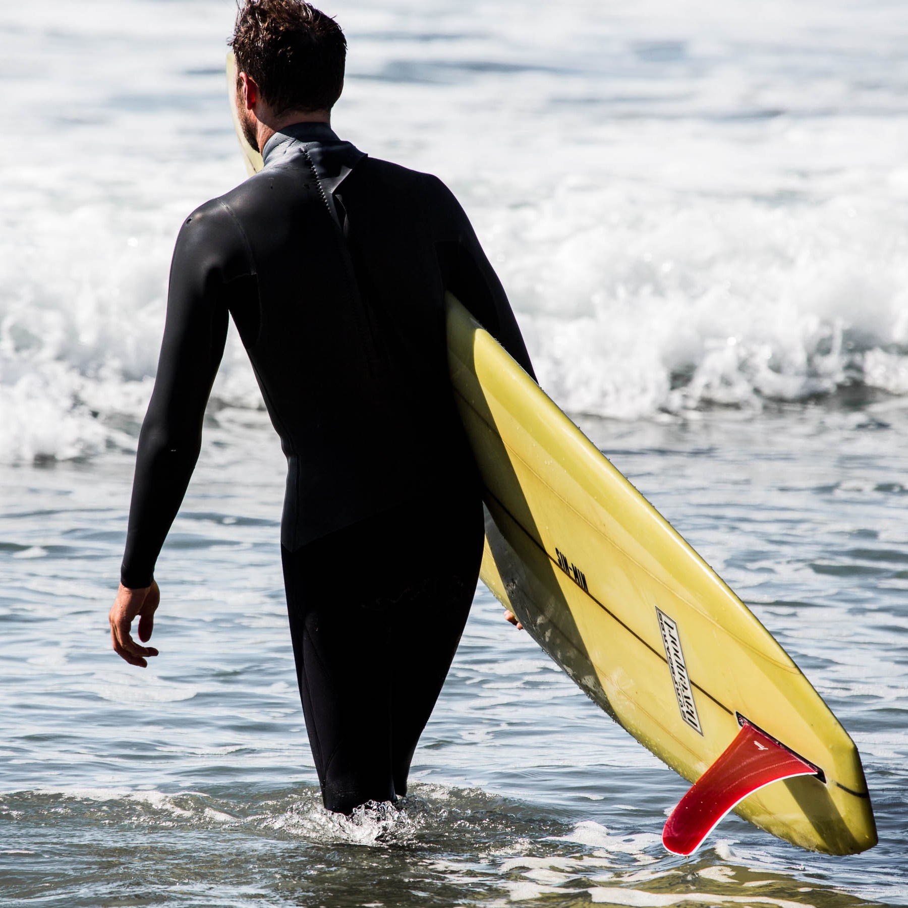 tcrit fullsuit walking into water